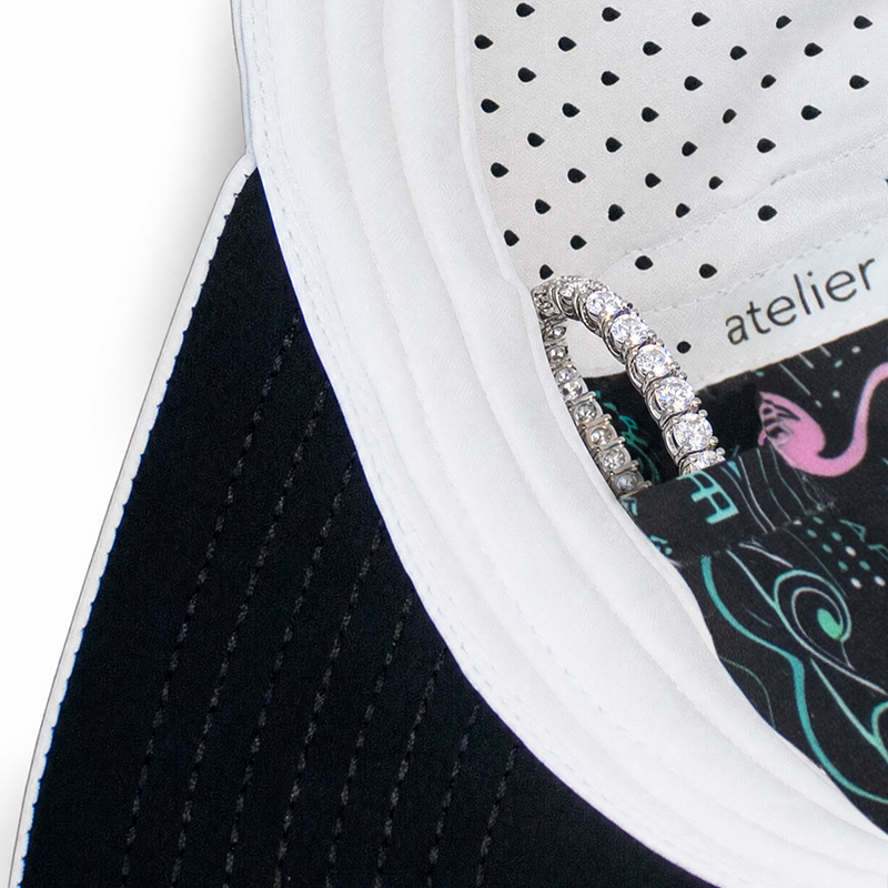APA Golf Hat White, interior crown pocket holding a diamond bracelet