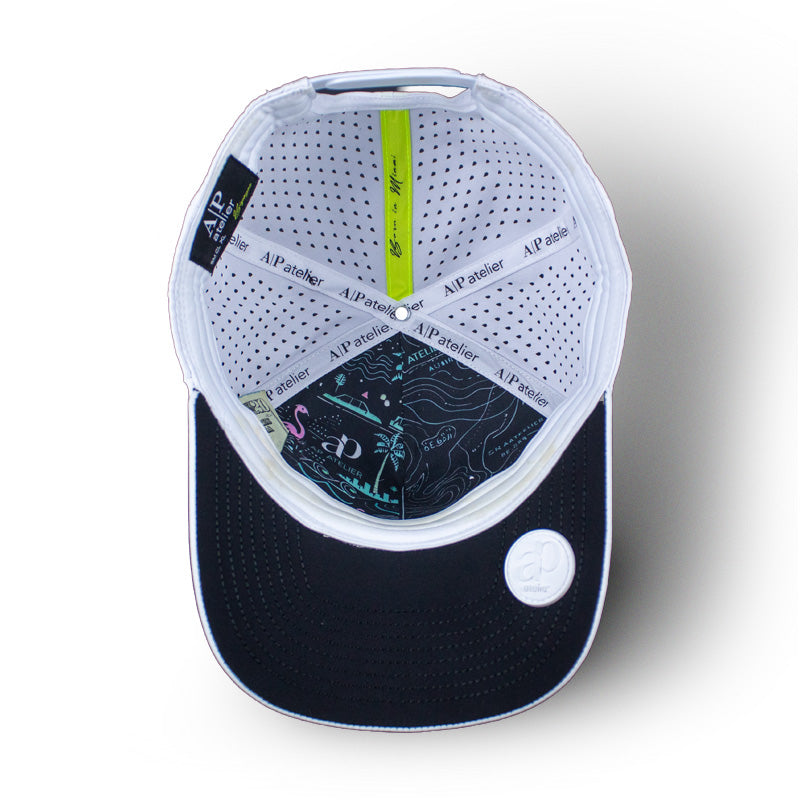 APA Golf Hat White, interior crown artwork — topographic map and neon flamingo